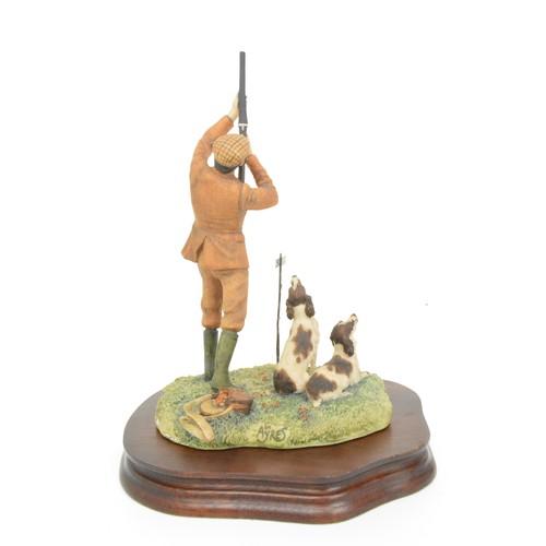 19 - Border Fine Arts Gamekeeper and spaniels figure, signed Ayres to back