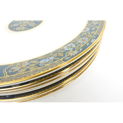 39 - Royal Doulton 'Carlisle' pattern part dinner service to include large platter, two oval serving dish... 