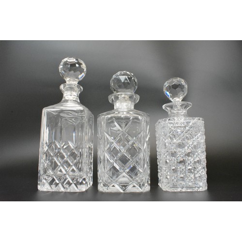 48 - Collection of crystal/glass decanters, all with stoppers and tray, also one decanter label hallmarke... 