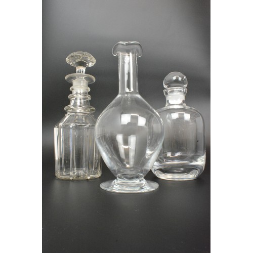 48 - Collection of crystal/glass decanters, all with stoppers and tray, also one decanter label hallmarke... 