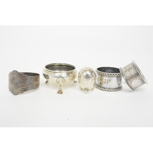 222 - Silver items consisting napkin rings, salt pot (no liner), pepperette, all hallmarked. gross combine... 