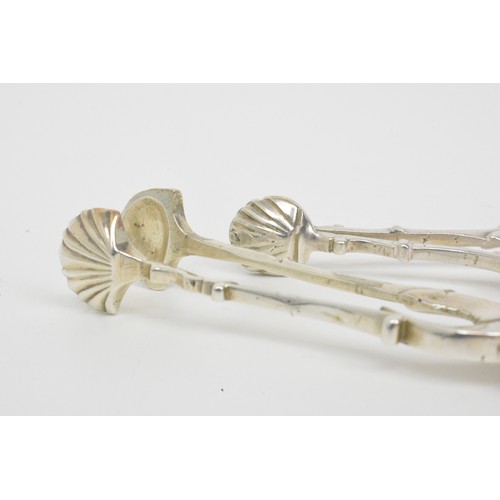 226 - x2 sugar/ice cube tongs with shell nip design, one stamped with lion passant