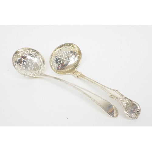 243 - x2 antique silver sugar spoons with pierced detailing. Hallmarked London. Approx gross weight 118g.