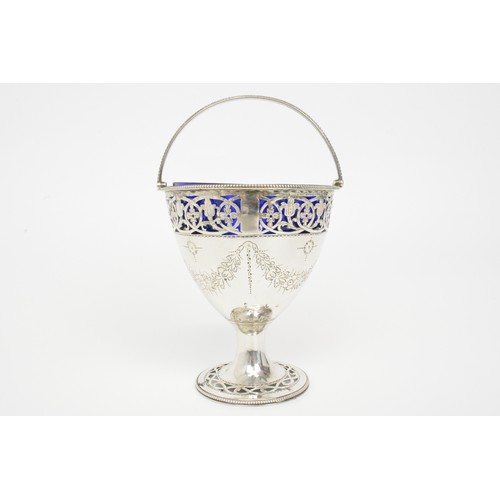 247 - Antique Silver sugar basket with blue liner.  Pierced foliate design with swags and bow engraving, h... 