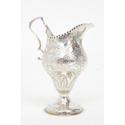 250 - Antique Silver gilt jug with engraved flower/foliate design, hallmarked London poss.c.1783. marks wo... 