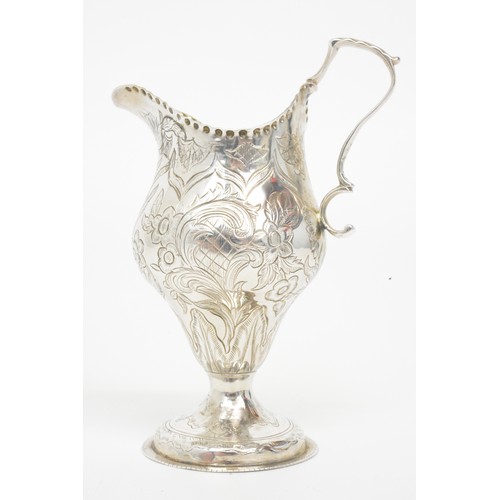 250 - Antique Silver gilt jug with engraved flower/foliate design, hallmarked London poss.c.1783. marks wo... 