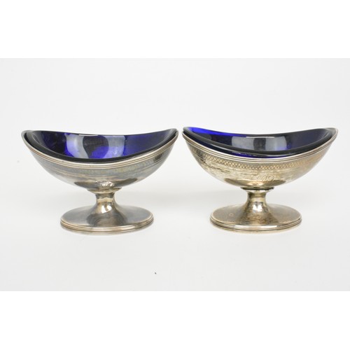 Pair of antique Georgian silver salts with cobalt blue glass liners, hallmarked London 1798, maker John Emes