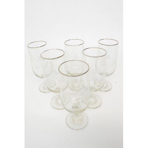 6 - Retro pitcher with glasses, together with a set of six stemmed glasses with decorative motif