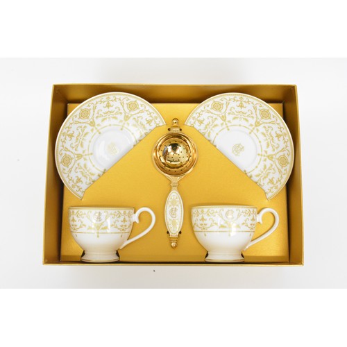 13 - William Edwards Fine bone China boxed couple's bespoke teacup set with strainer, as new.