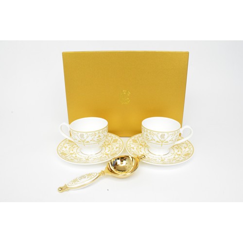 13 - William Edwards Fine bone China boxed couple's bespoke teacup set with strainer, as new.