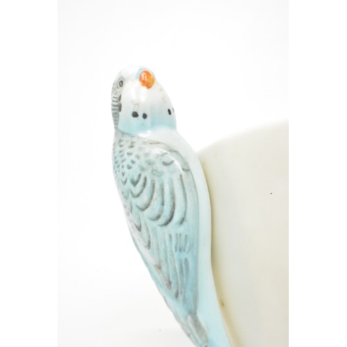 15 - Vintage Falcon vase with budgerigar, design number 874858, 17cms tall, together with 'springtime' fl... 