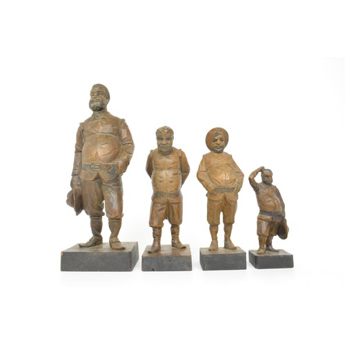 33 - Group of 4 Sancho Panza hand carved wood figures, marks stamped to base. Tallest figure is 28 cms, s... 