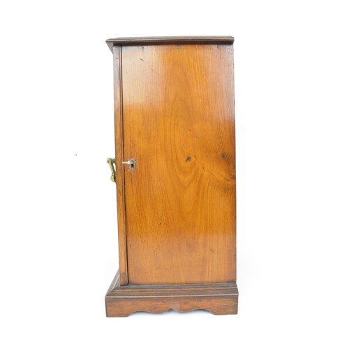 53 - Smokers cabinet, Oak cased with bevelled glass to front panel with two over one drawers with brass b... 