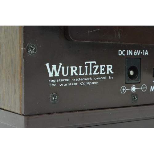 66 - Wurlitzer The Dukebox Cassette Player together with Steepletone Model NR-825 battery operated radio