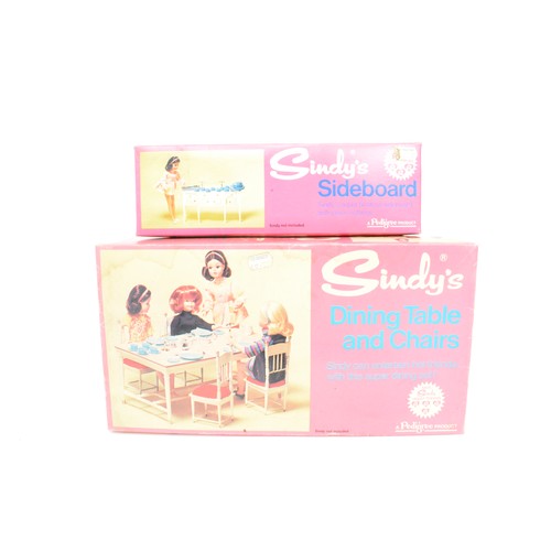 83 - Collection of Sindy Doll items to include boxed dining table + chairs. 2 x bed + bedclothes, sideboa... 