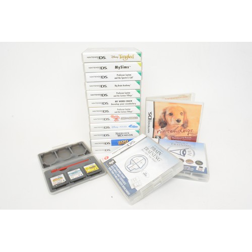 86 - Retro Nintendo DS lite, model no. USG-001 x 2 with power supply, 15 DS game cartridges in boxes, tog... 