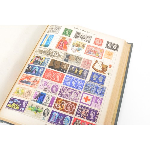 92 - Stanley Gibbons Swift Shaw stamp album containing large quantity of stamps from around the world inc... 