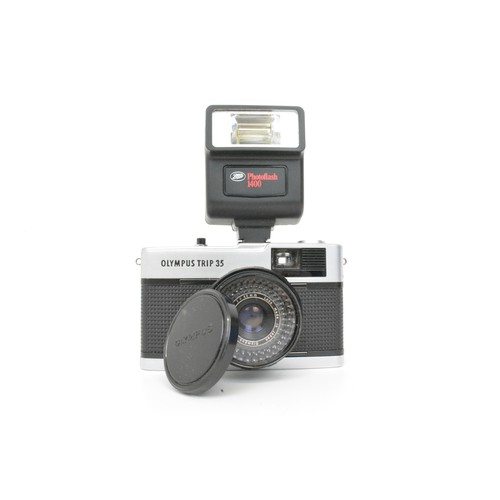 96 - Olympus Trip 35 compact camera with Olympus Zuiko lens together with film, flash unit, a monocular a... 