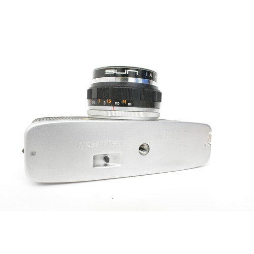 96 - Olympus Trip 35 compact camera with Olympus Zuiko lens together with film, flash unit, a monocular a... 