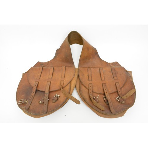 113 - Vintage leather saddle bag marked 'US' to each bag. All Sale proceeds are in aid of Royal British Le... 