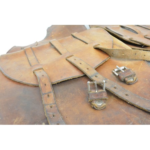 113 - Vintage leather saddle bag marked 'US' to each bag. All Sale proceeds are in aid of Royal British Le... 