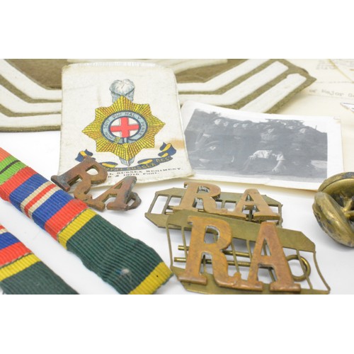 123 - WW2 and later British military badges both metal and cloth, lanyard and others