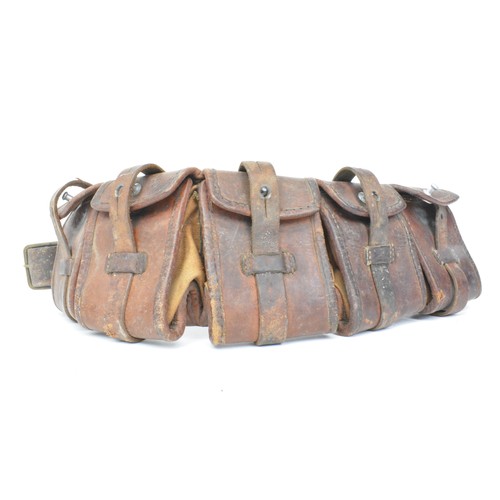 132 - Brown Leather five pouch ammunition belt with brass/aluminium fittings. All Sale proceeds are in aid... 