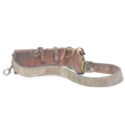 132 - Brown Leather five pouch ammunition belt with brass/aluminium fittings. All Sale proceeds are in aid... 