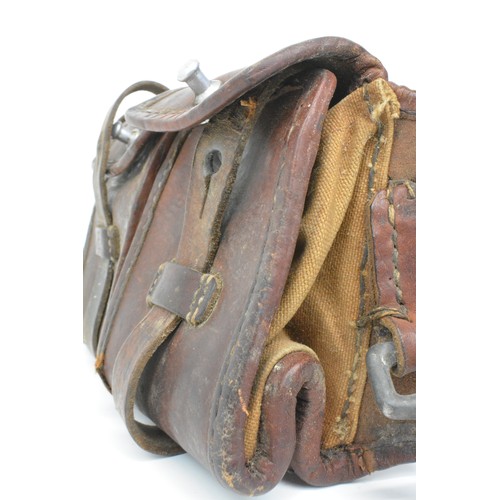 132 - Brown Leather five pouch ammunition belt with brass/aluminium fittings. All Sale proceeds are in aid... 