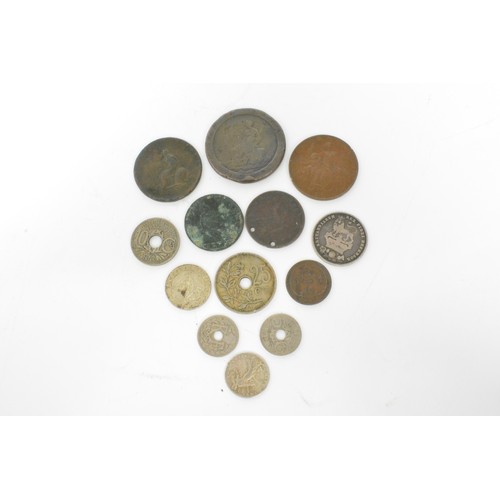 150 - A group of mixed coinage, some of which are silver