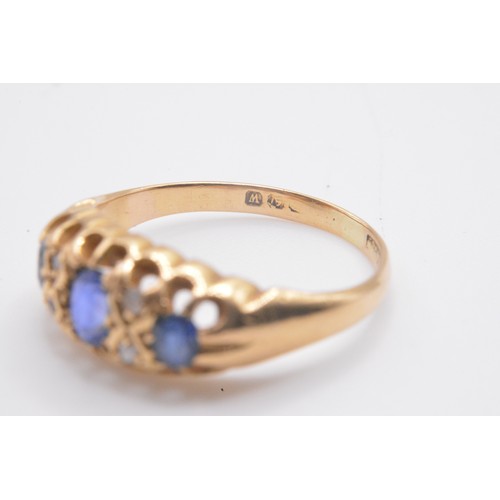 159 - Ceylon Sapphire and diamond yellow gold ring, approx. size K/L