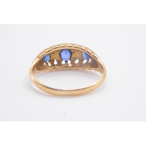 159 - Ceylon Sapphire and diamond yellow gold ring, approx. size K/L