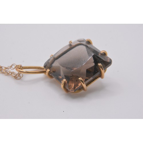 165 - Smokey quartz jewellery items consisting ring (size P) hallmarked Birmingham 375., earrings, pendant... 