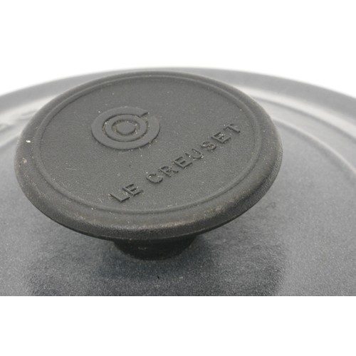 45 - Le Creuset saucepan set, with pan, heavy cast iron enamel, finished in grey/cream.