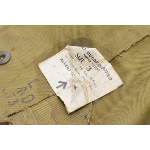 116 - Military 1946 rider's rain coat, officers cap marked S.D. Cap 1944 airborne 61. , gauntlets, chaps/g... 