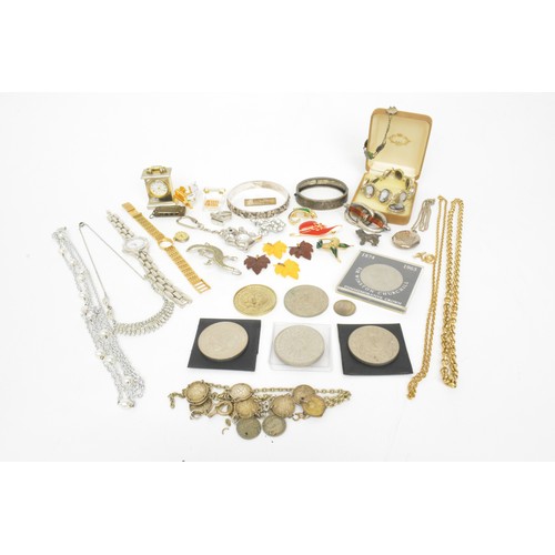 153 - A quantity of mixed costume jewellery to include some silver items, watches, medallions, etc.