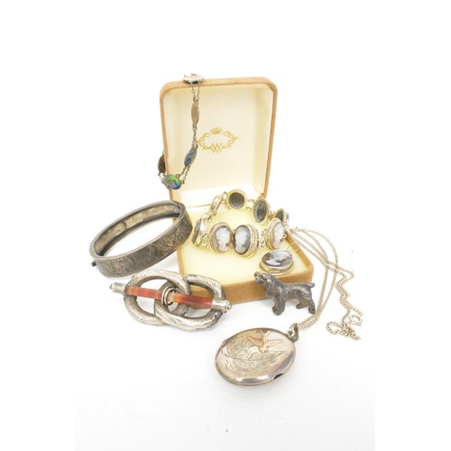 153 - A quantity of mixed costume jewellery to include some silver items, watches, medallions, etc.