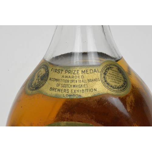 28 - 1960's Bottle Red Hackle De luxe blended scotch whisky 26. 2/3 fl.ozs 70% proof