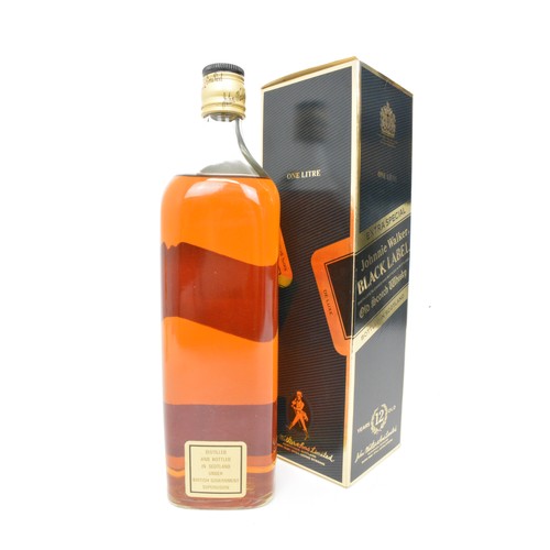 30 - 1L bottle of Johnnie Walker Black Label Old Scotch Whisky aged 12 years together with 1L bottle of L... 