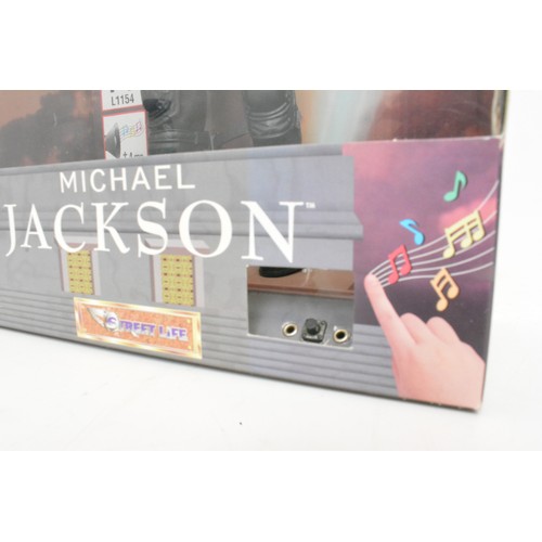 53 - Michael Jackson Musical Figure Doll plus beat it clothing pack by Streetlife c.1997, working in time... 