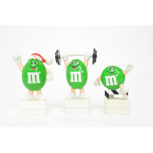 60 - Mix of novelty M&M figurines to include aeroplane, footballer and skier