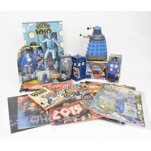 64 - Doctor Who collectibles, to include money boxes, trivial pursuit, cyber man figure, keyrings etc.