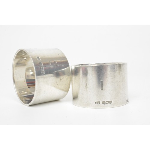 228 - Boxed pair of Viners solid silver napkin rings, hallmarked Sheffield 1937, approx gross weight 123g