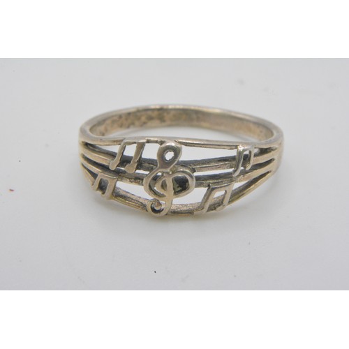 236 - 925 silver bracelet 'musical note symbols together with 925 matching ring size m/n.  together with 9... 