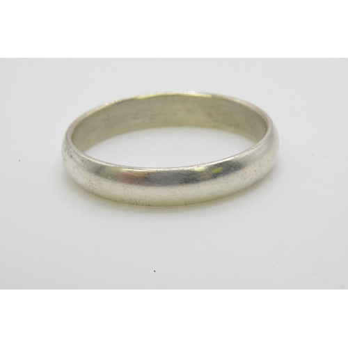 241 - Two silver rings, one with green stone stamped 925