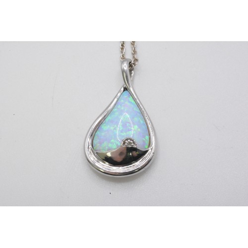 243 - Silver opal pendant with small diamond, reverse reads 'I am with you still in each new dawn' by Brad... 