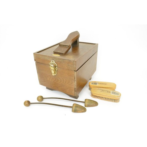121 - Vintage wooden shoe shine box with footrest attachment and contents 'Jones The Bootmaker'