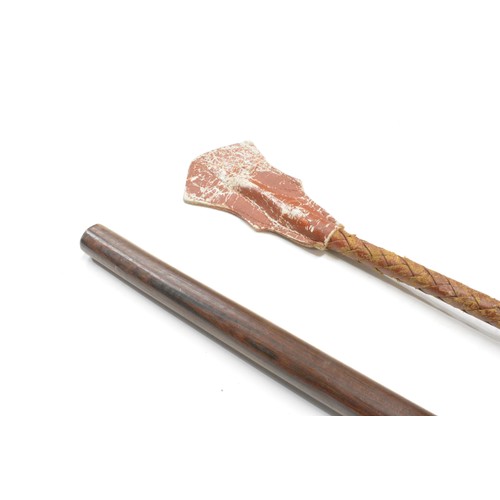 135 - Vintage hardwood walking cane with twisted shaft together with braided leather riding crop