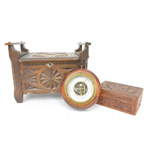 144 - Arts and Crafts carved box (with key) together with small carved box and small circular French barom... 