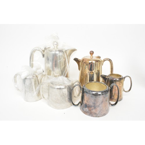 145 - Silver plated group consisting cocktail shakers, candlesticks, tea and fish knives, some new and box... 